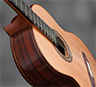 Photograph of classical guitar with raised fingerboard